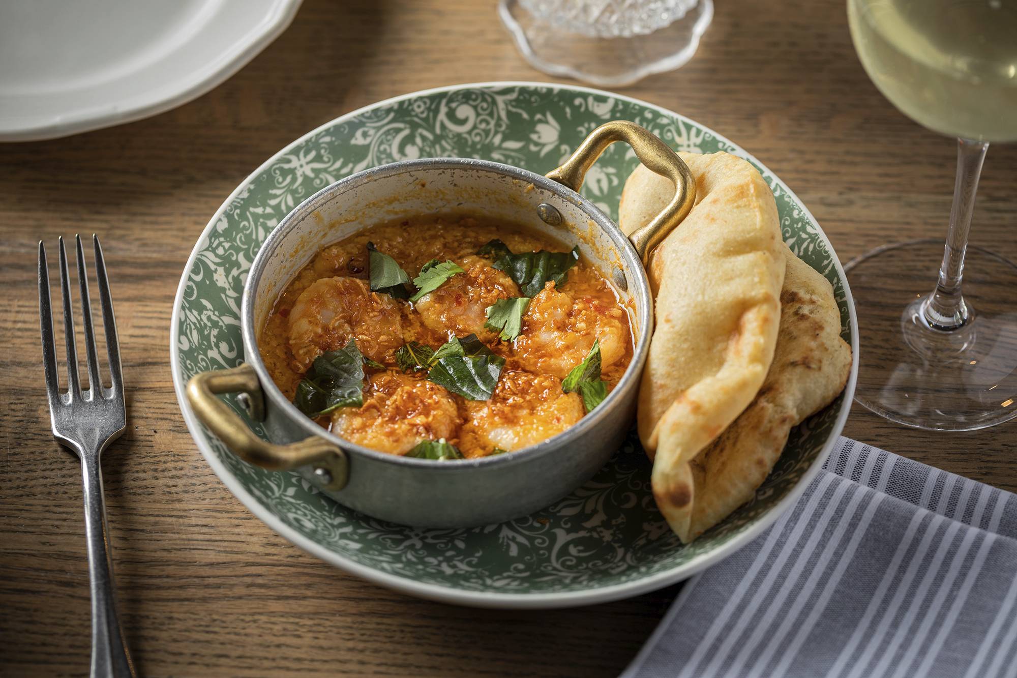 bubbling shrimp with naan from etta in chicago