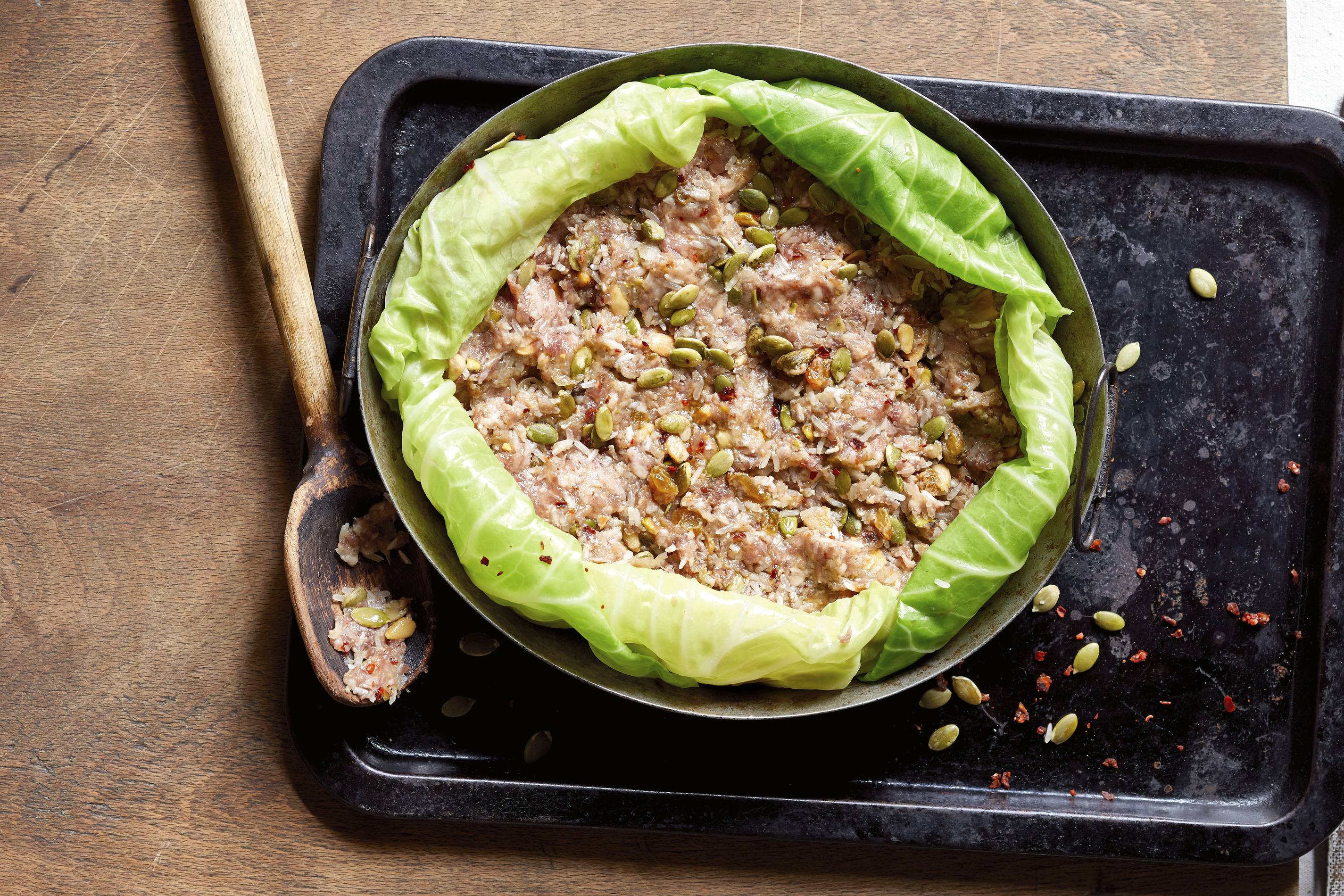 Cabbage Cake stuffed with beef, nuts and raisins
