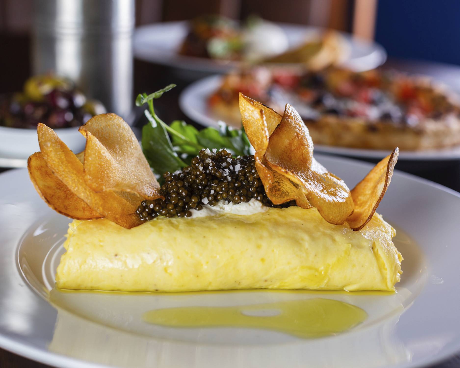 Potato Chip Omelette with caviar by Cathedrale Restaurant in NYC