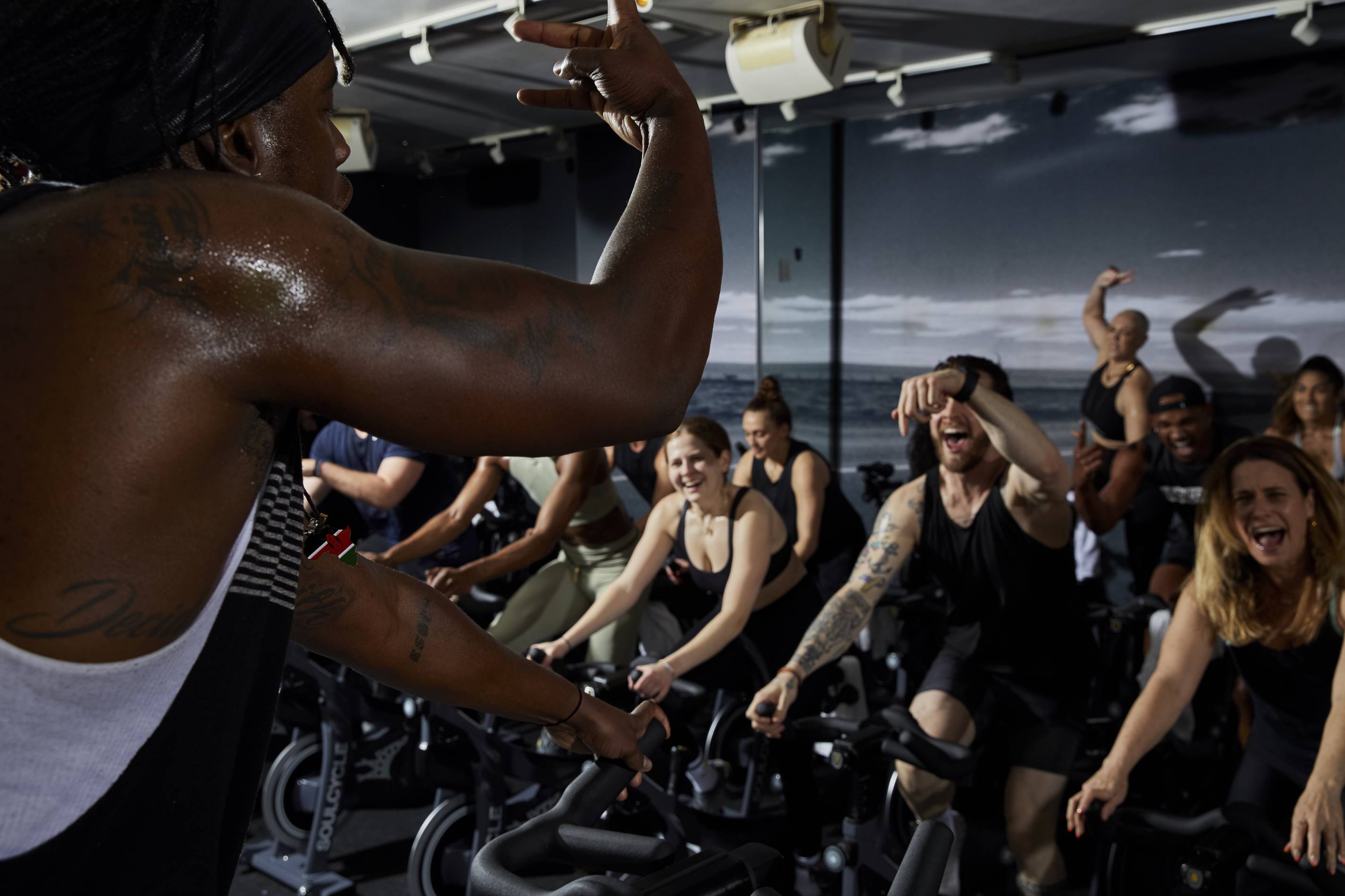 people smile while working out at soulcycle