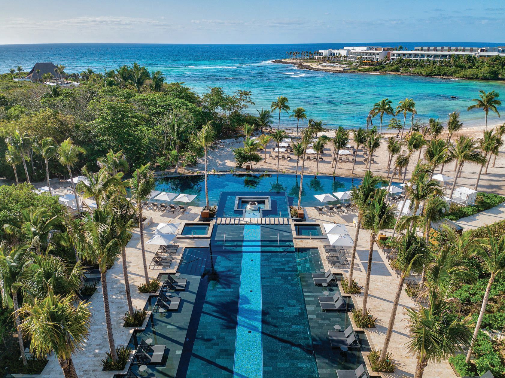 Dive into paradise and enjoy one of the five pools on property PHOTO COURTESY OF CONRAD TULUM RIVIERA MAYA