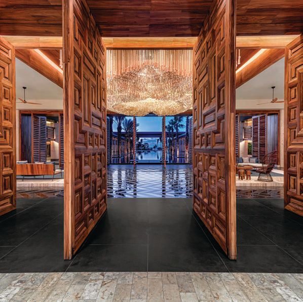 the lobby features ornate  wooden doors engraved by local artisans. PHOTO COURTESY OF CONRAD TULUM RIVIERA MAYA