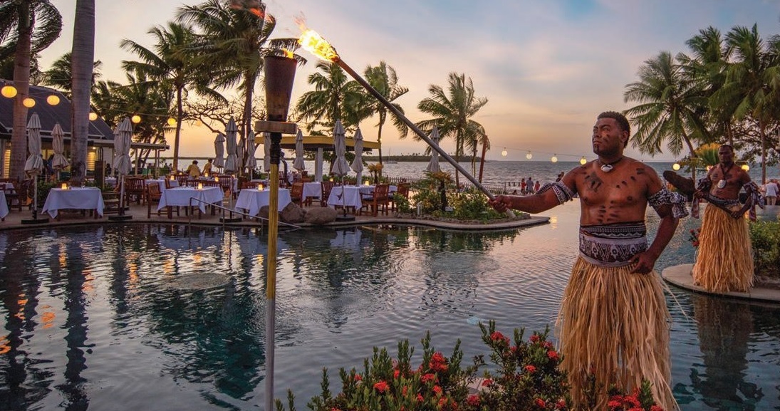 Fijian performers entertain guests by night at the poolside Watui Bar & Grill PHOTO COURTESY OF SOFITEL FIJI RESORT & SPA