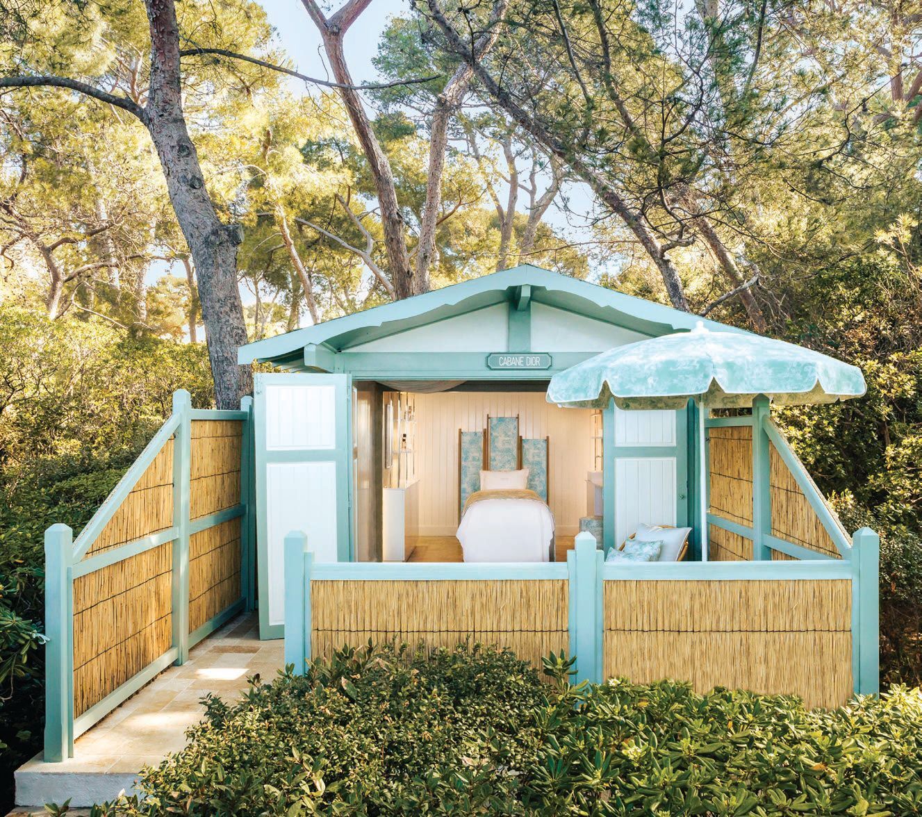 A historic cabana decorated in shades of sage green and white offers a treatment cocoon for one PHOTO COURTESY OF BRAND