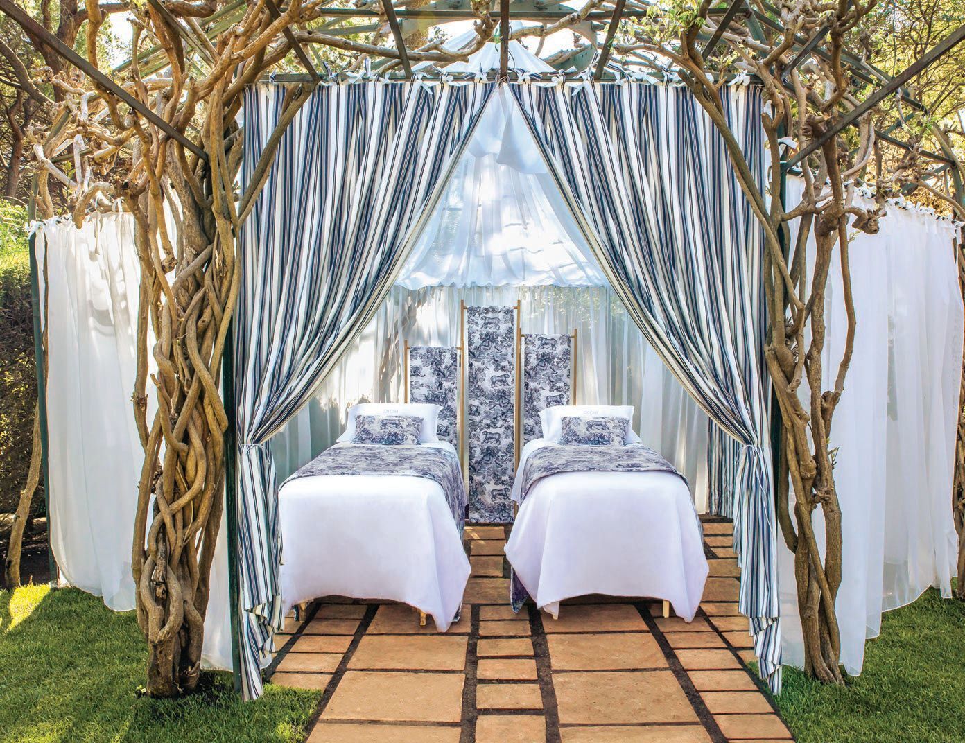 Enjoy your treatment in a gazebo facing the 100-year-old rose garden dedicated to Queen Elizabeth II PHOTO COURTESY OF BRAND