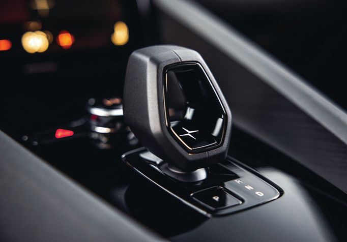 The hexagonal gear shifter boasts an illuminated Polestar symbol at its center, just one of the auto’s many intricate design touches. PHOTO COURTESY OF BRAND