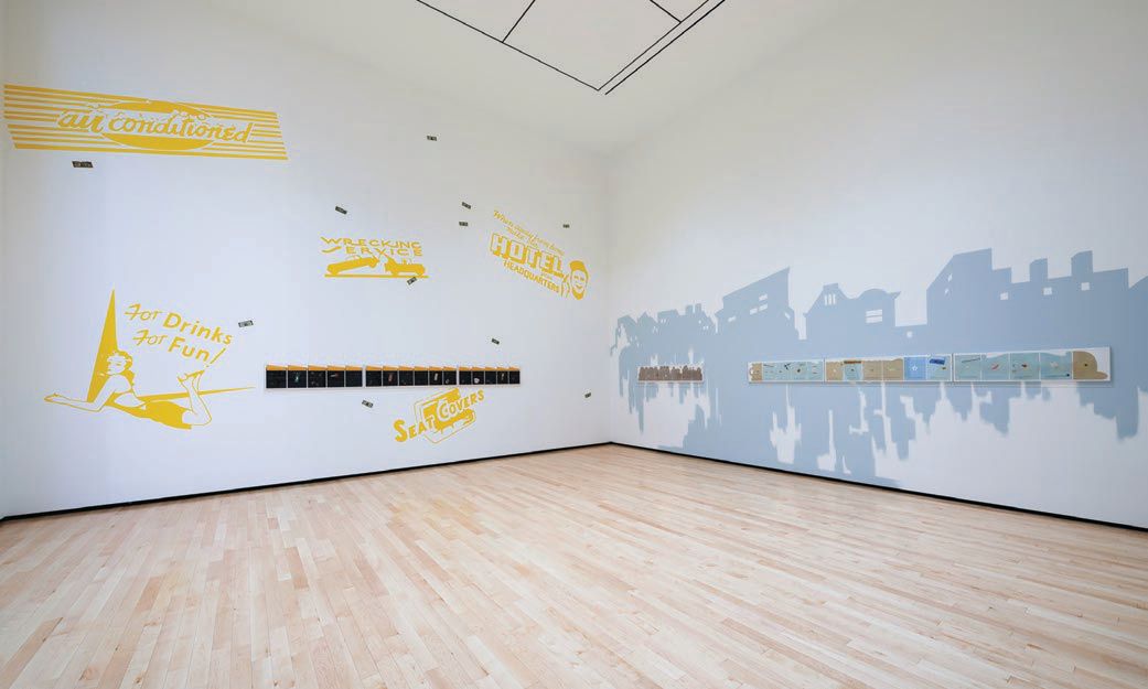 Installation views of Alexis Smith: The American Way at Museum of Contemporary Art San Diego include the Marilyn Monroe-inspired “Men Seldom Make Passes at Girls Who Wear Glasses” (1985, wall painting with two framed mixed media collages), a focal point of the multiroom display. PHOTO © PHILIPP SCHOLZ RITTERMANN. 2022