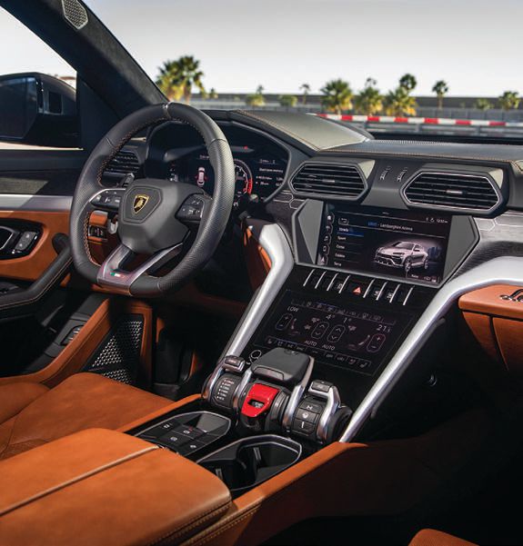 The Urus features the largest carbon ceramic brakes on a production SUV; the new Lamborghini infotainment system has a double touch screen. Opposite page. PHOTO COURTESY OF AUTOMOBILI LAMBORGHINI