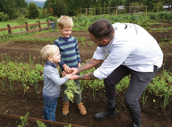 young guests enjoy a tour of the  organic garden at Chile’s andBeyond Vira Vira lodge PHOTO COURTESY OF BRAND