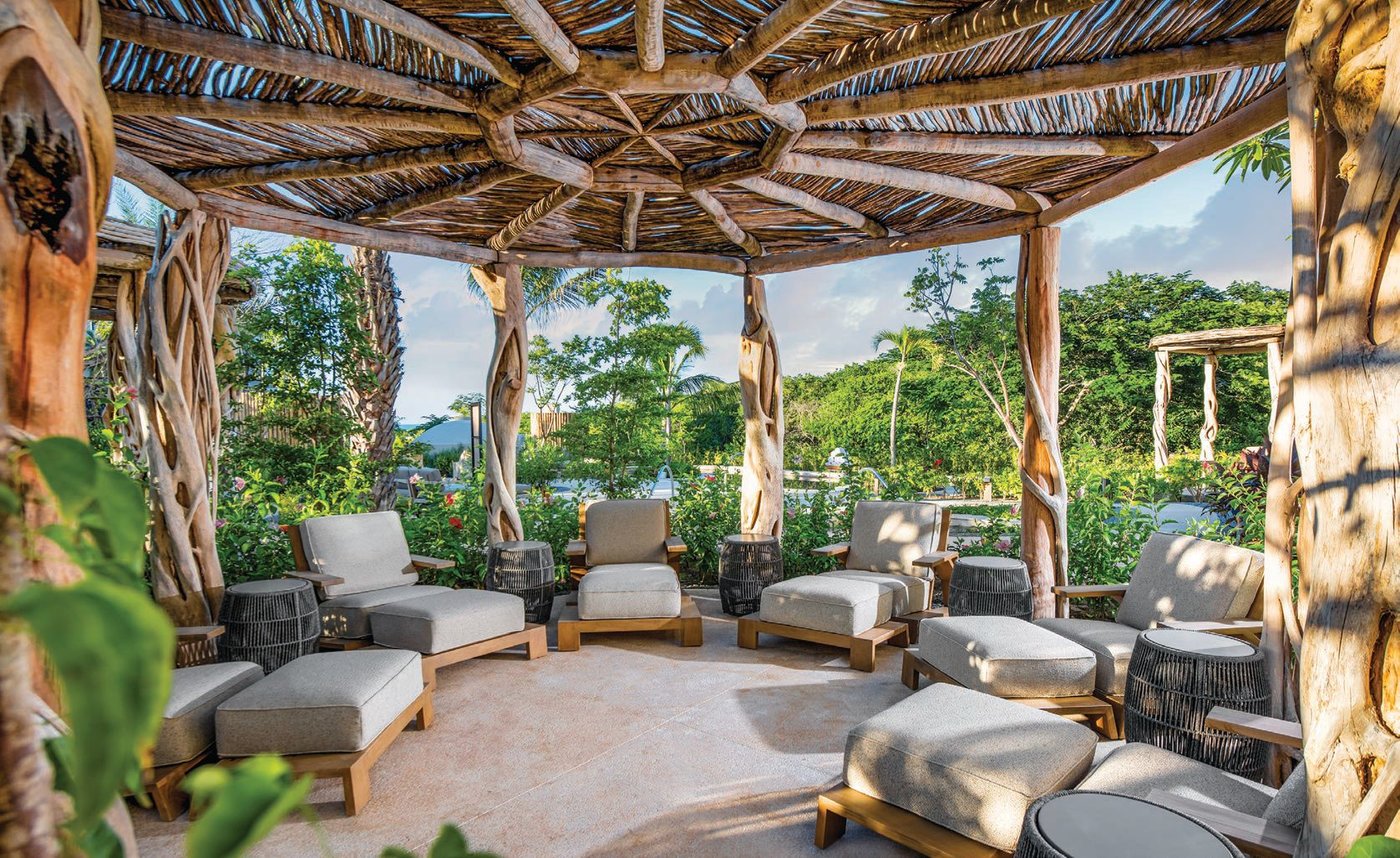Th e Conrad Spa allows relaxation enthusiasts to unwind in outdoor lounge areas among lush landscaping or experience treatments in alfresco spaces. PHOTO COURTESY OF CONRAD PUNTA DE MITA
