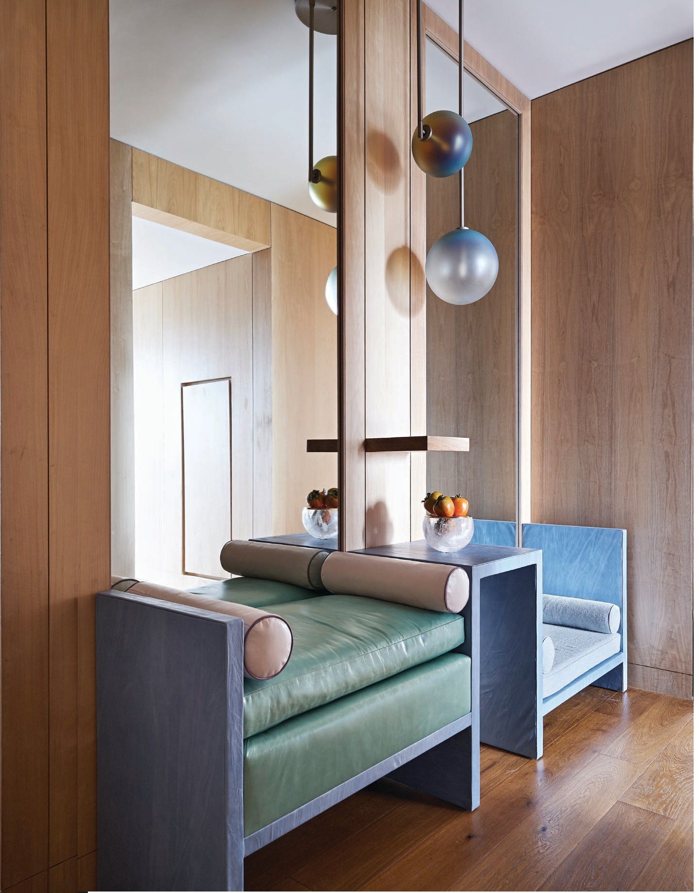 In the foyer, lighting from The Future Perfect and a custom bench upholstery by Anthony Lawrence Belfair with Romo leather and a pet cushion fabric by Perennials and Sutherland Photographed by Björn Wallander