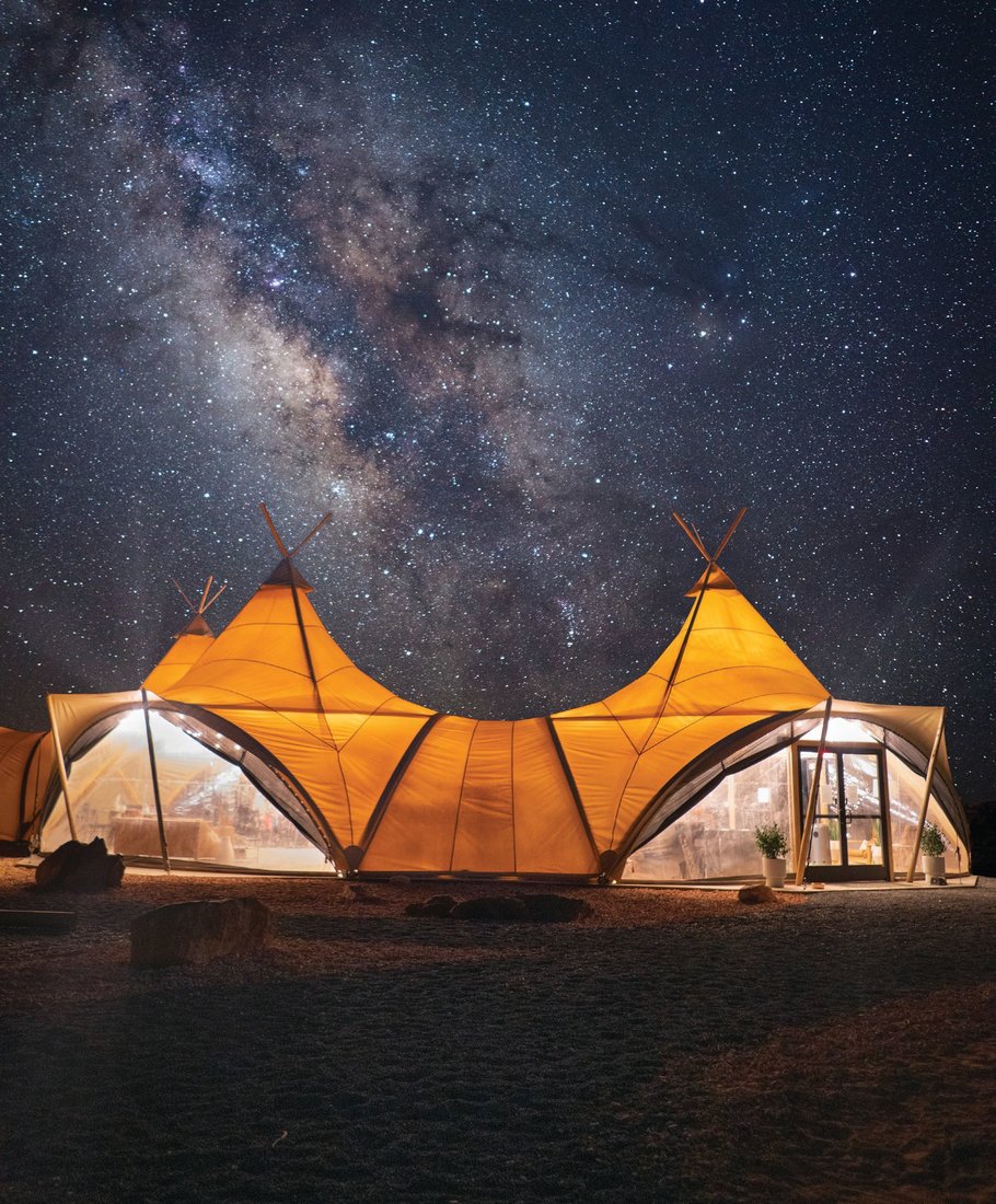 Take in thousands of stars from your private tent or near the property’s main lobby, shown here. PHOTO BY TRAVIS BURKE