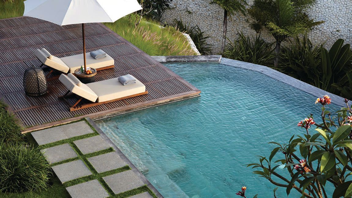 A stunning courtyard and pool area at one of the Bulgari Resort Bali mansions PHOTO COURTESY OF BULGARI HOTELS & RESORTS