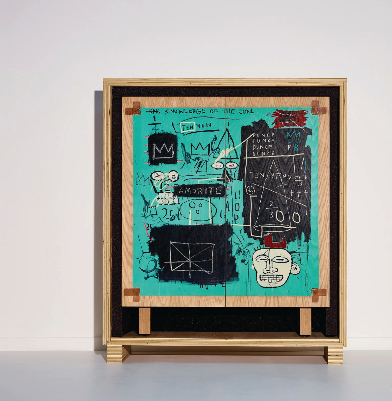 Crafted by hand from white oak, Tiffany & Co.’s 4-foot advent calendar features the artwork of Brooklyn-born artist Jean-Michel Basquiat, “Equals Pi.” PHOTO COURTESY OF BRAND