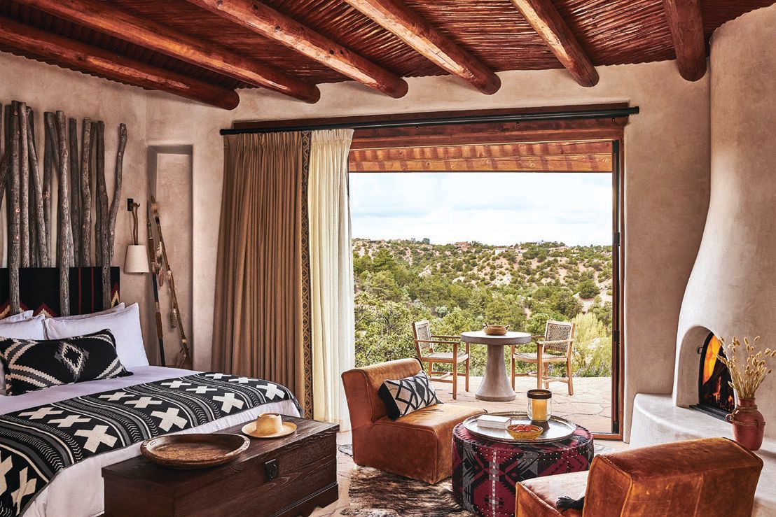 Accommodations beckon with chic native textiles and double-sided kiva fireplaces. PHOTO COURTESY OF AUBERGE RESORTS COLLECTION