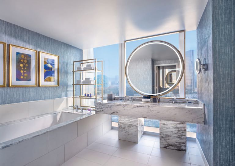 The bathroom in the Panorama Suite will leave you feeling like you’re floating in the sky BATHROOM AND BEDROOM PHOTO BY MARK MEDIANA/DREX AGENCY