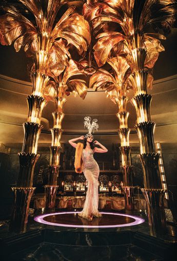 Delilah’s brass palm trees and lively performers are sure to become a storied part of Las Vegas nightlife BRASS PALM TREES PHOTO BY MYRIAM SANTOS