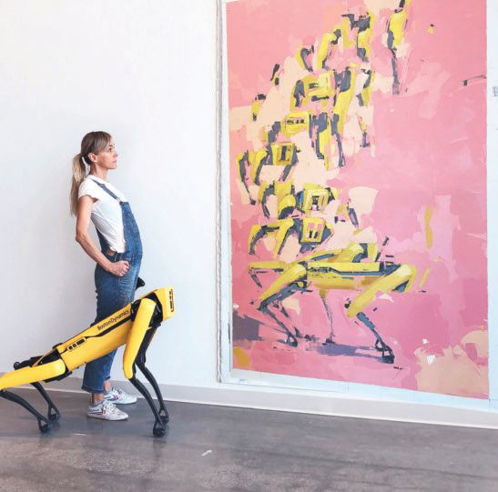 Agnieszka Pilat assesses her portrait of Spot, a robotic dog, with the subject itself: “Nude Descending a Staircase” (2020, oil on Belgian linen), 90 inches by 56 inches. Pilat also taught Spot to paint. PHOTO COURTESY OF AGNIESZKA PILAT