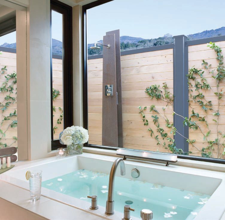 The property’s inviting spa bathrooms let the outside in. PHOTO COURTESY OF BARDESSONO HOTEL & SPA