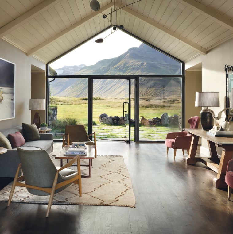 Floor-to-ceiling windows throughout the property frame the surrounding epic landscape PHOTO COURTESY OF ELEVEN EXPERIENCE