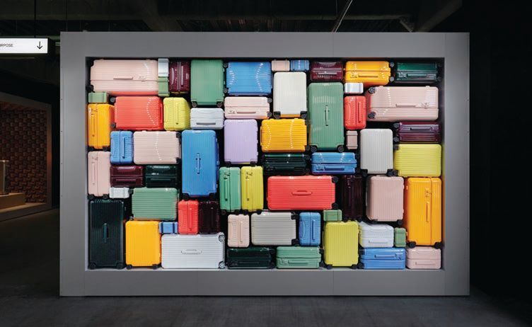 A full spectrum of colors are on display PHOTO COURTESY OF RIMOWA FROM SEIT 1898 EXHIBITION