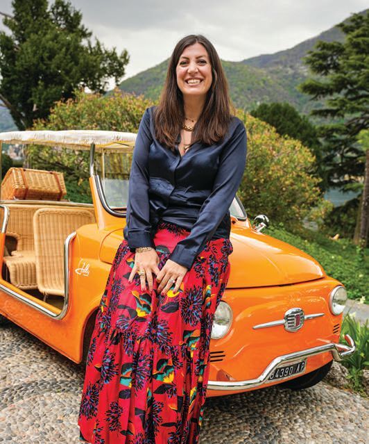 CEO Valentina De Santis, the third-generation leader of the family-owned and -operated resorts, and her zippy Fiat PHOTO: BY MICHAEL MCCARTHY