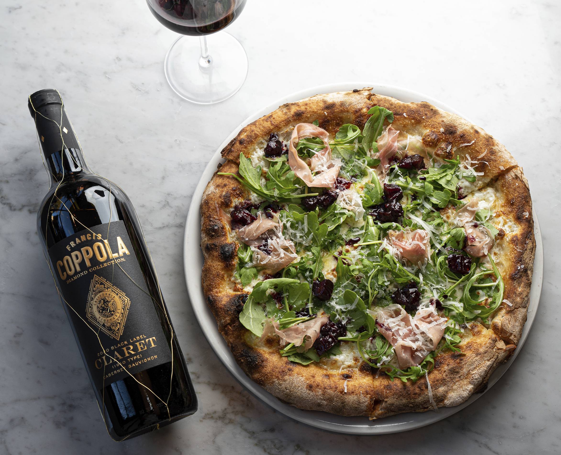 The Cal-Ital pizza by chef Dan Richer, paired with Francis Ford Coppola's Diamond Collection Claret red wine