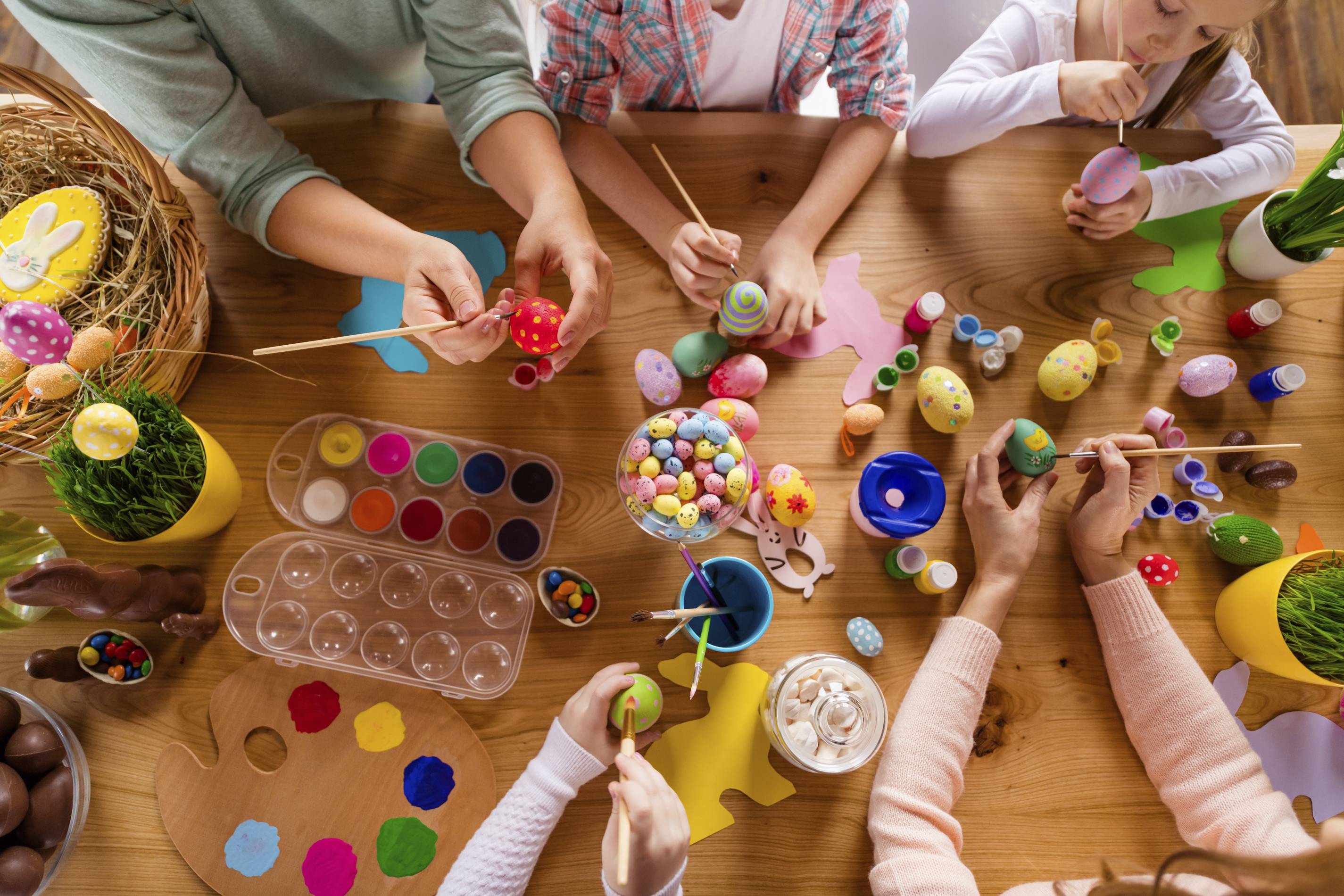 a family enjoys easter crafts