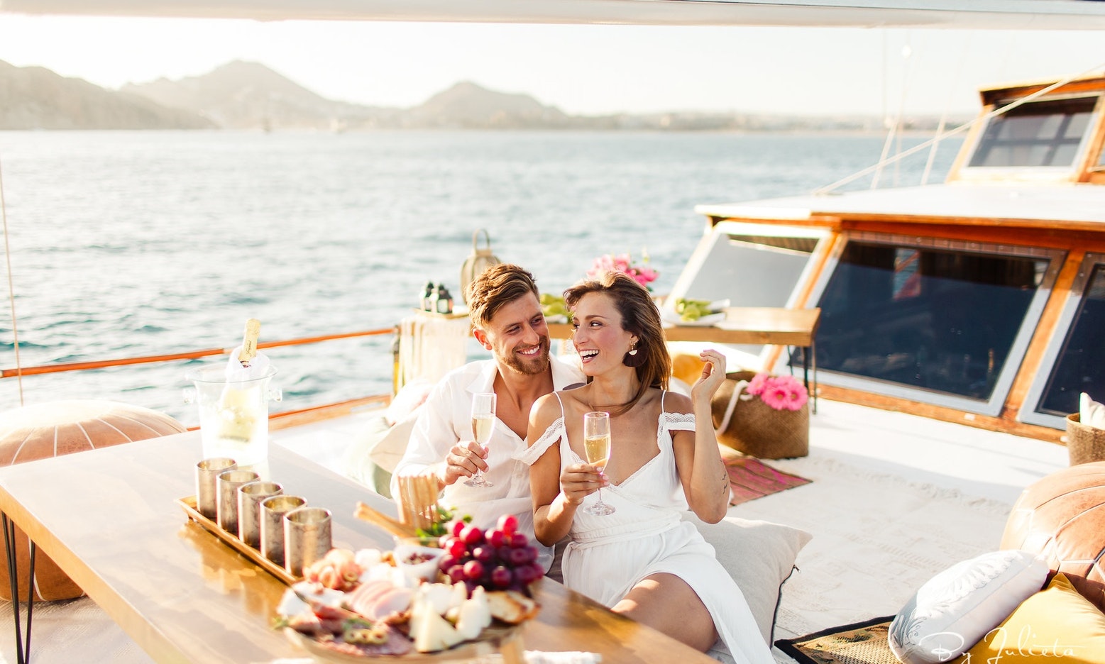 A couple enjoys a GetMyBoat rental in Cabo