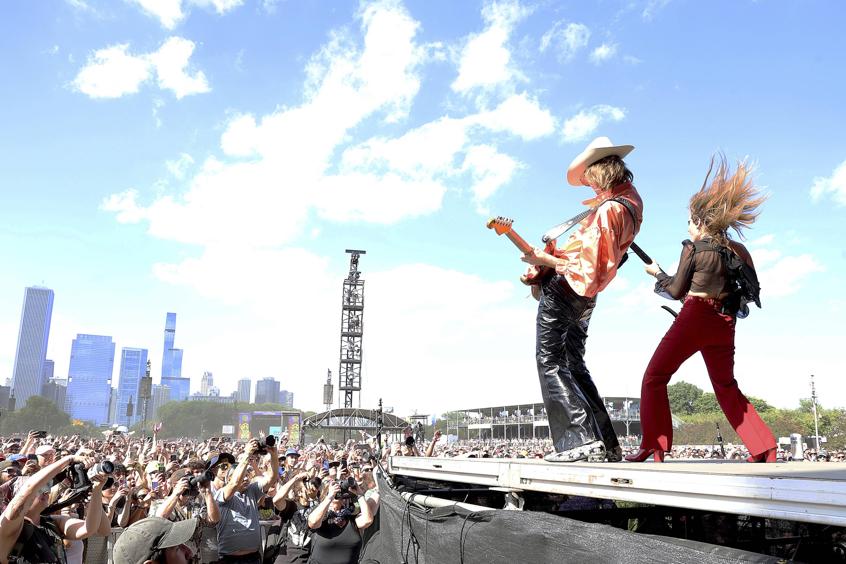 musicians perform on stage at lollapalooza in chicago