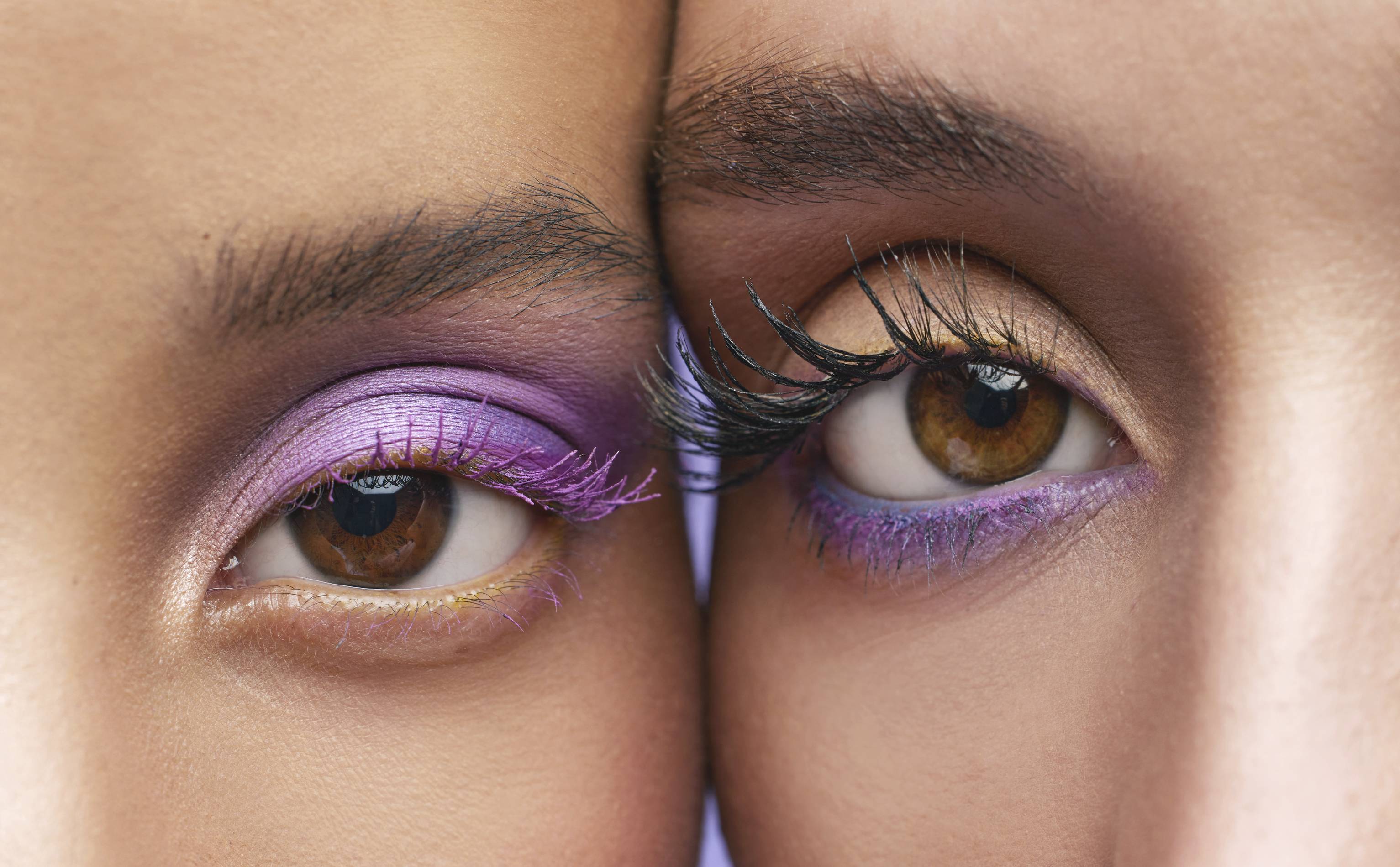 makeup models show off their colorful eyeshadow