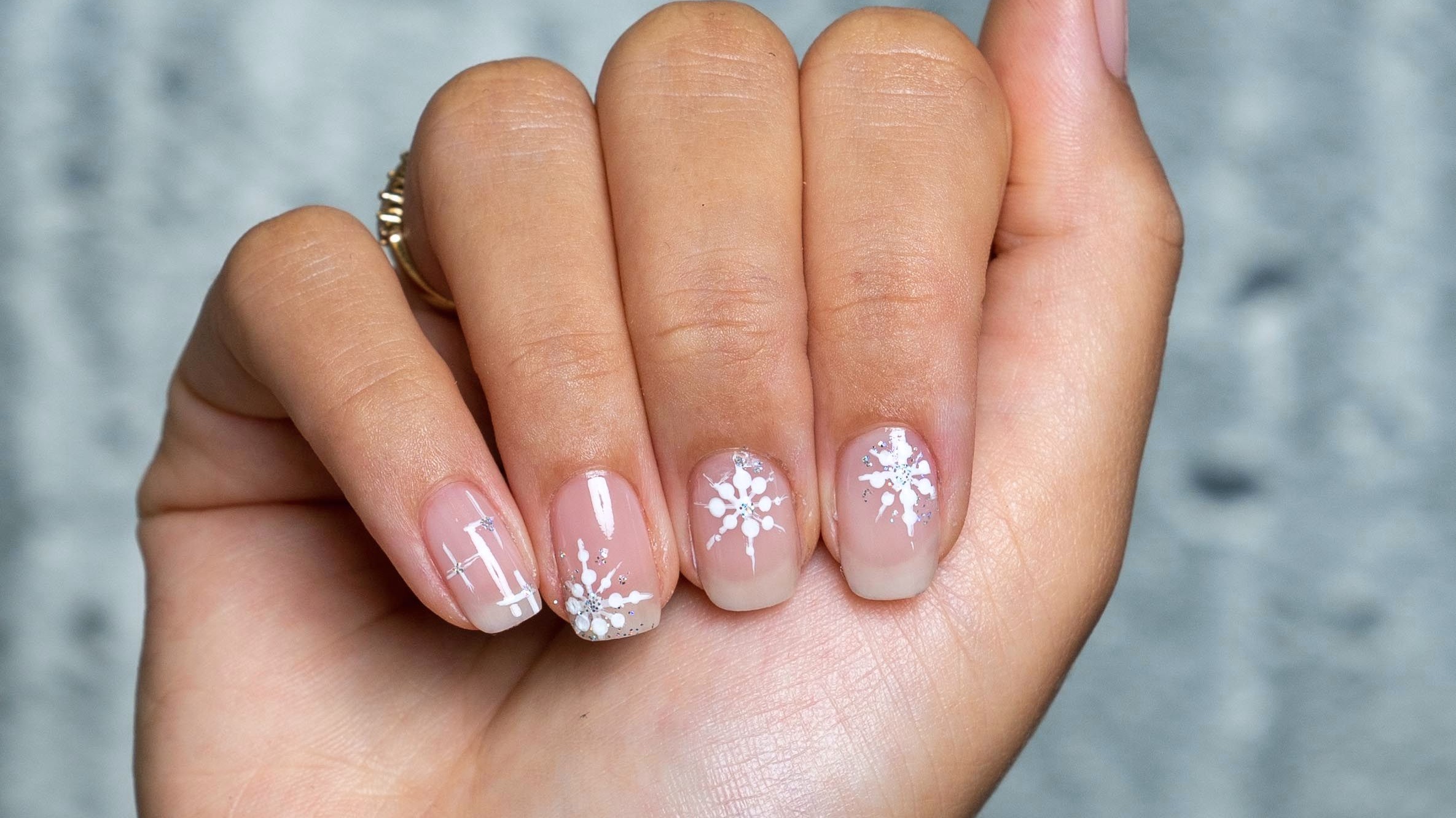 nude with snowflake design by bellacures nail artists