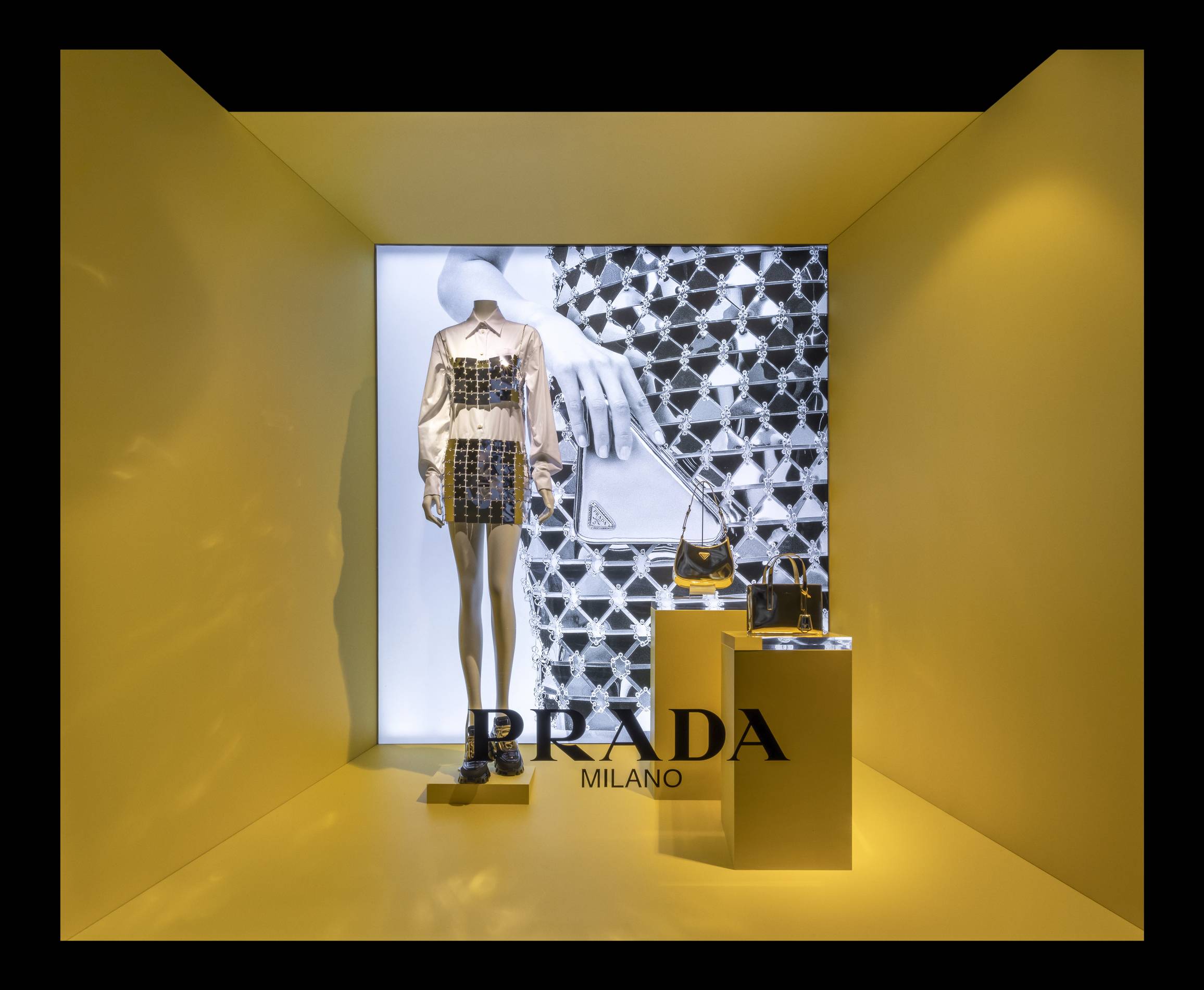 prada's holiday collection window display at saks fifth ave in nyc