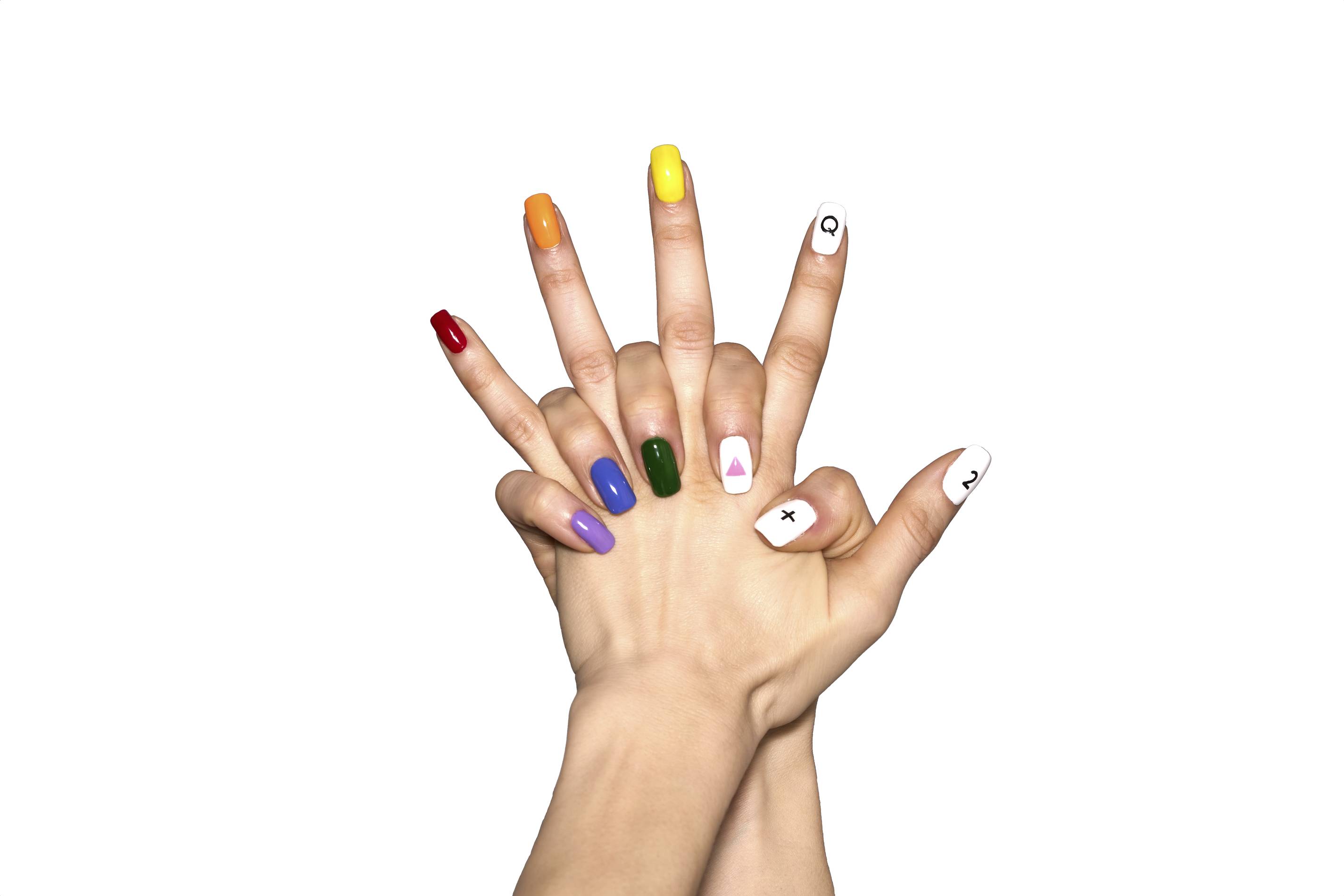 a woman with rainbow nails for pride month